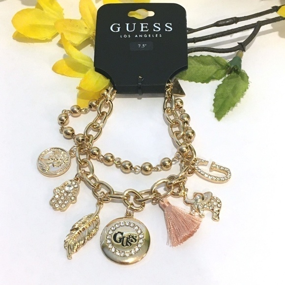 3/$29! GUESS Charm Bracelet Tassel, Elephant, Leaf - Picture 2 of 7